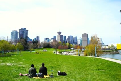 Couple having some rest in Spray park in downtown Vancouver Eastside.