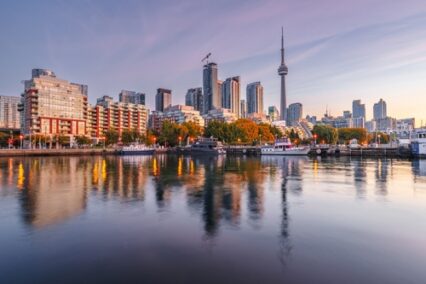 Toronto, Ontario, Canada downtown city skyline at twilight in the fall season.