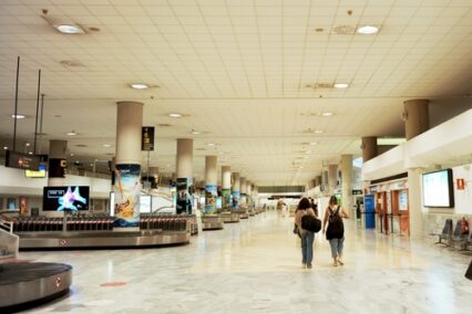 People at the terminal in Lanzarote César Manrique Airport, Canary Islands, Spain
