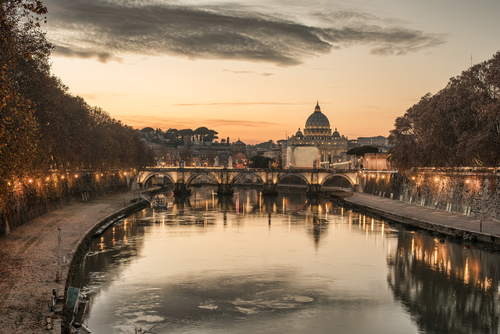 St. Peter's Basilica, Saint Angelo Bridge in the beautiful sunrise.