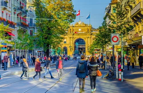 Traffic and shopping mall on Bahnhofstrasse in Zurich, Switzerland. Bahnhofstrasse is one of the most expensive shopping streets in the world.