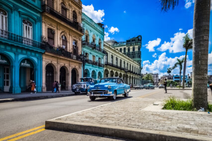 American blue 1954 Chevrolet Bel air classic car drives on the main road in Havana Cuba - Serie Cuba Reportage