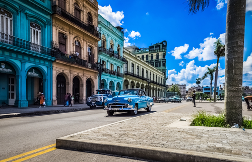 American blue 1954 Chevrolet Bel air classic car drives on the main road in Havana Cuba - Serie Cuba Reportage