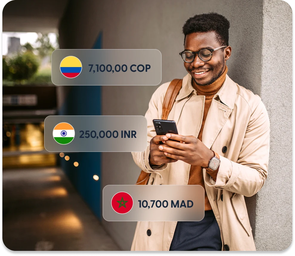 Business owner checking exchange rates on a phone